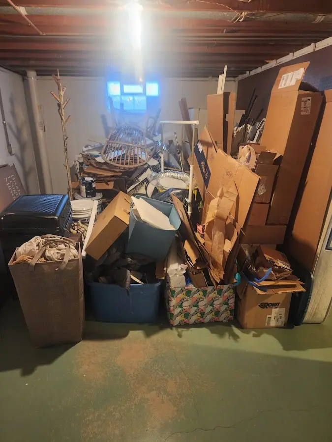 Roll-off dumpster container at job site for 2 Yard Dumpster Rental in Bellmead